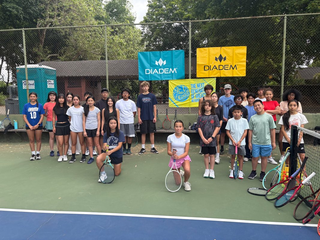 Coach and players at the net